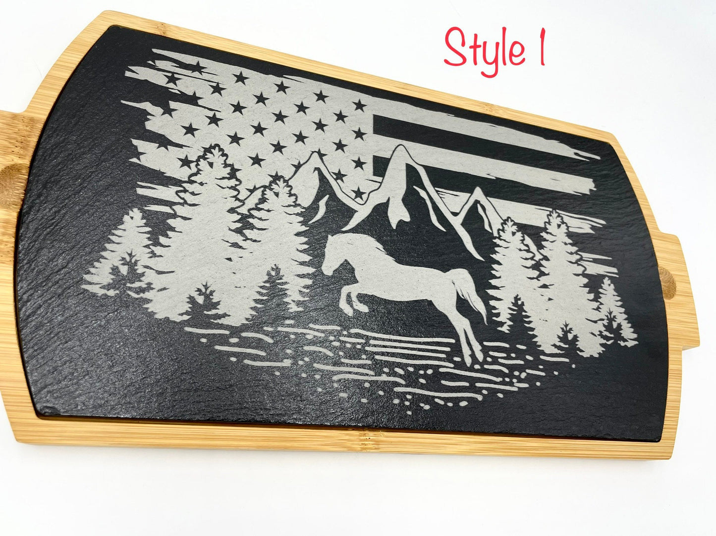 Engraved slate charcuterie board with horse, mountains, trees and american flag. Bamboo on the outside edges. Slate serving tray